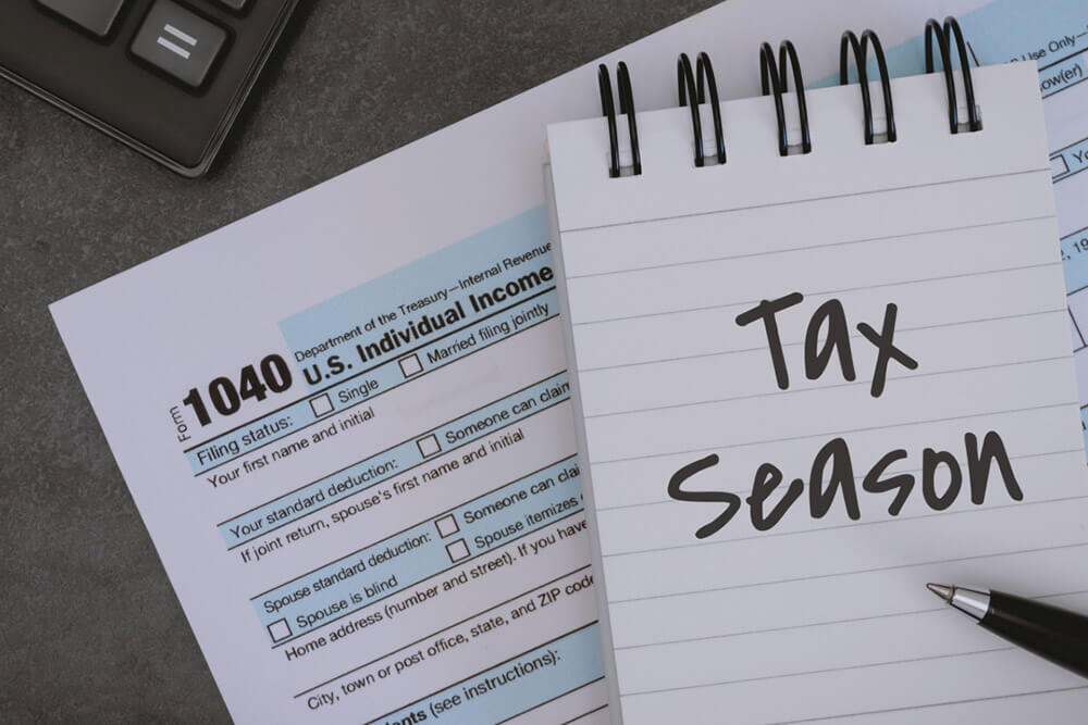 business woman using calculator